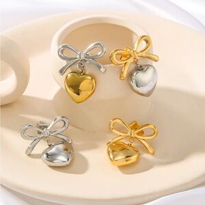 E91 - Silver Tone Heart Gold Tone Bow Dangle Earrings Feminine Coquette